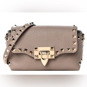 VALENTINO GARAVANI
Pebbled Calfskin Mini Rockstud
Crossbody Bag Poudre